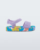 Side view of a purple baby Imagine sandal.