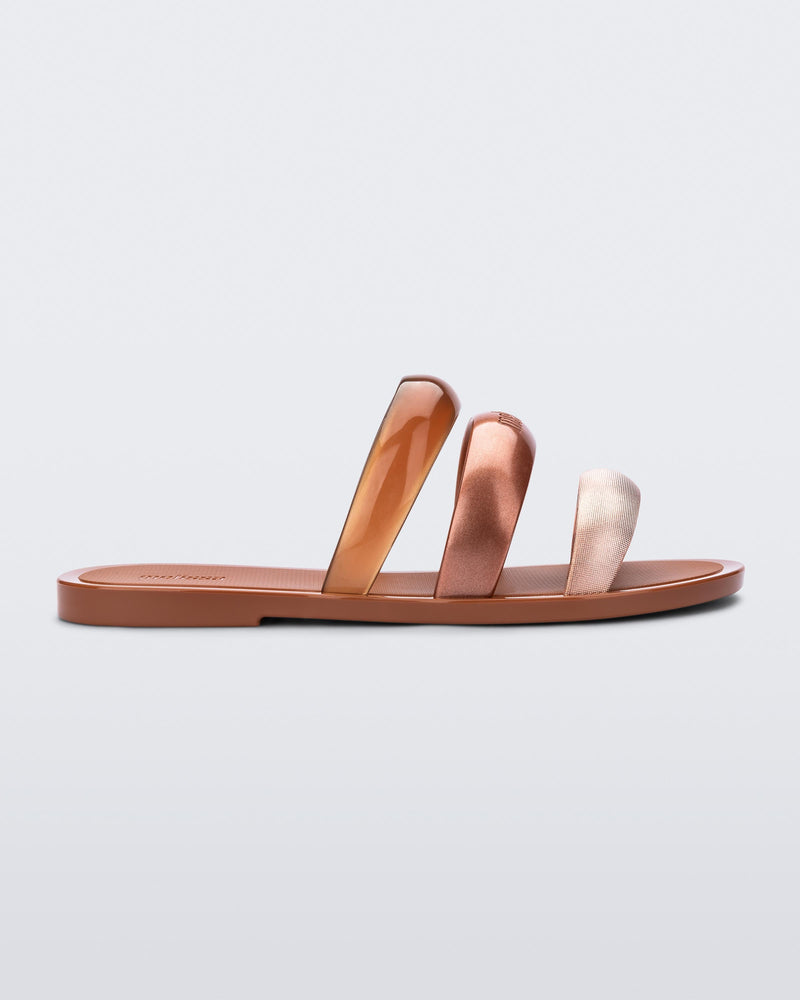 Side view of the brown with gold/bronze straps Eclipse Slide.