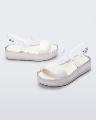 Product element, title Float Platform in Clear/White
 price $59.40