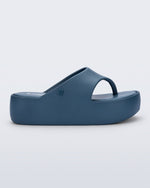 Side view of a blue Free Platform Thong sandal