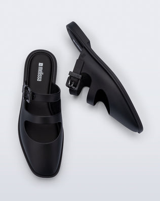 Side and top view of a pair of matte black Anastasia slide mules