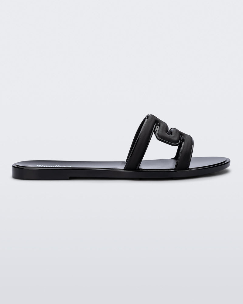Side view of a black M Slide. 
