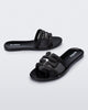 Angled view of a pair of black M Slides.
