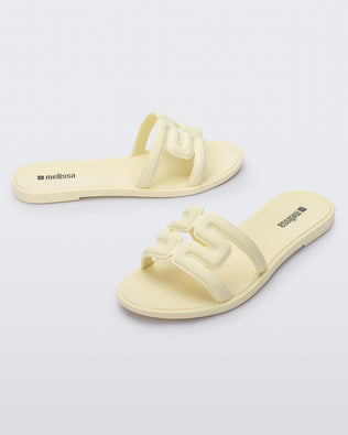 Product element, title M Slide in Yellow/Beige
 price $59.00