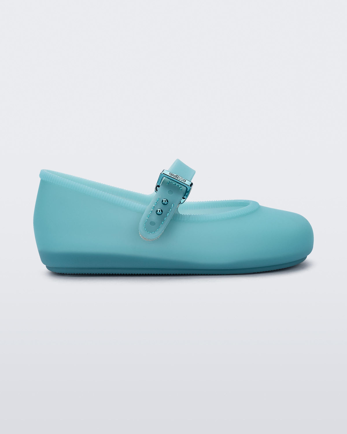 Side view of a milky blue Soft Ballerina baby flat