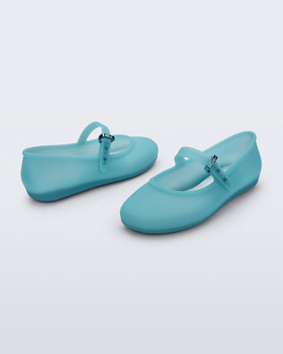 Back and side view of a pair of milky blue Soft Ballerina kids flats