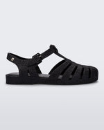 Side view of a glitter black Possession fisherman sandal
