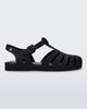 Side view of a glitter black Possession fisherman sandal