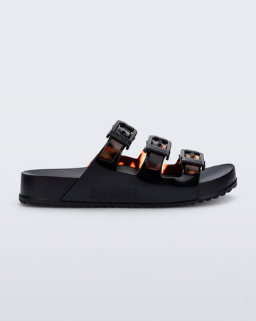 Melia ☻ Cozy Stripes Slide in Black/Clear Tortoise | Melissa Shoes US