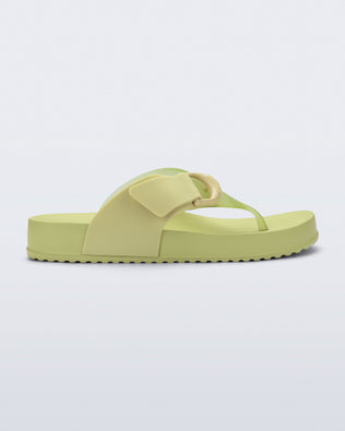 Side view of a green Cozy Thong Flip Flop