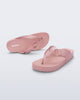 Top and angled view of a pair of pink Cozy Thong flip flops