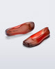 Top and angled view of a pair of transparent red Ruby + Nodaleto flats