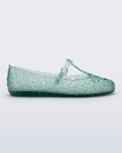 Side view of a clear green Melissa + Susan Fang Daphnis Ballerinas with t-top strap