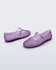 Back and side angled view of a pair of clear lilac Melissa + Susan Fang Daphnis Ballerinas with t-top strap