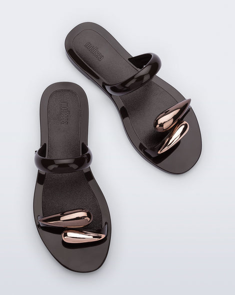 top view of a pair of brown Eden sandals with metallic upper accents