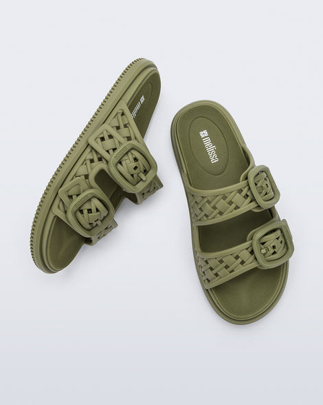 Top and side view of a pair of matte green Possession Slip sandals with two straps with buckles