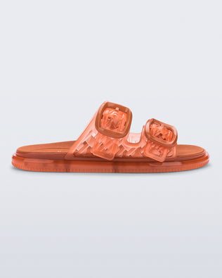 side view of an orange Possession Slip sandals with two straps with buckles