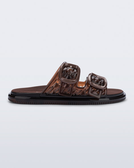 Side  view of a brown Possession Slip sandals with two straps with buckles
