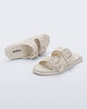Top and side view of a pair of beige Possession Slip sandals with two straps with buckles