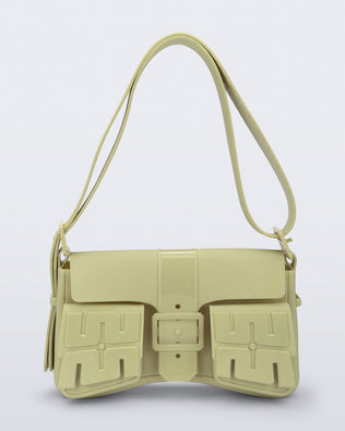 Front view of a pastel green Cargo bag with two small pockets on the front and an adjustable strap