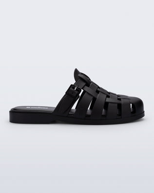 Side view of a matte black Possession Mule slide