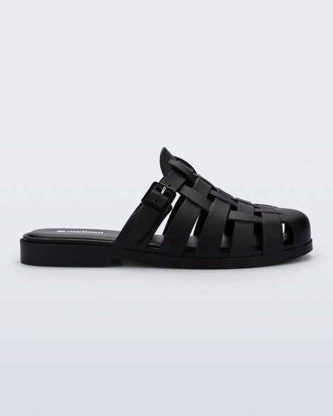 Side view of a matte black Possession Mule slide