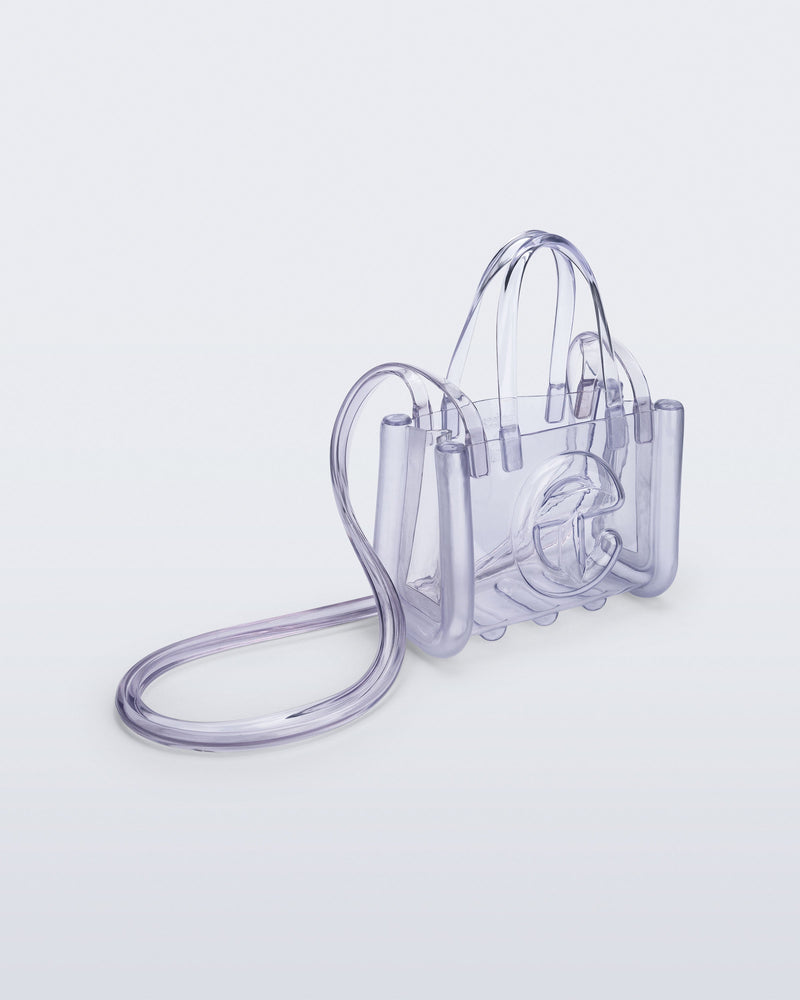 Angled view of the clear Small Jelly Shopper x Telfar bag