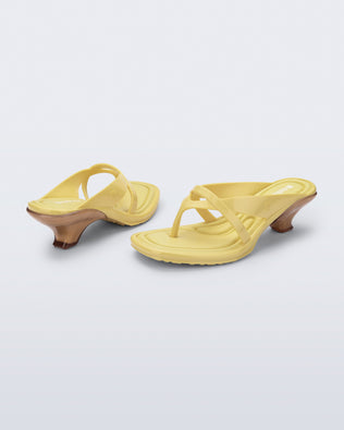 Back and side view of a pair of yellow Layla kitten heel flip flops