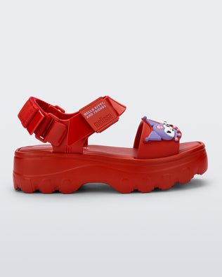 Side view of a red Kick Off Sandal + Hello Kitty and Friends with Hello Kitty and Friends on the upper strap