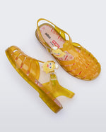Top view of a pair of transparent yellow Possession + Pop Mart Pucky fisherman sandals