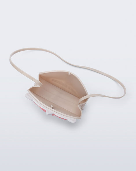 Top  view of a beige Dreamy Unicorn kids bag with button closure and strap