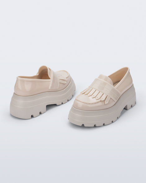 Back and angled view of a pair of beige Royal Plus Platform loafers