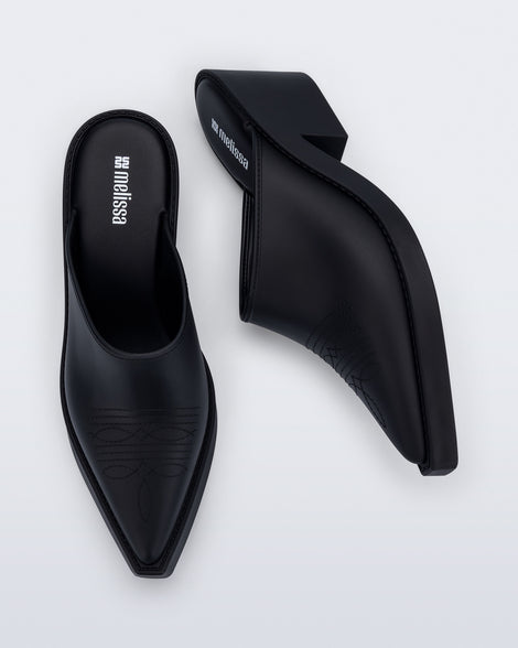 Side and top view of a pair of matte black Texas Mule heels