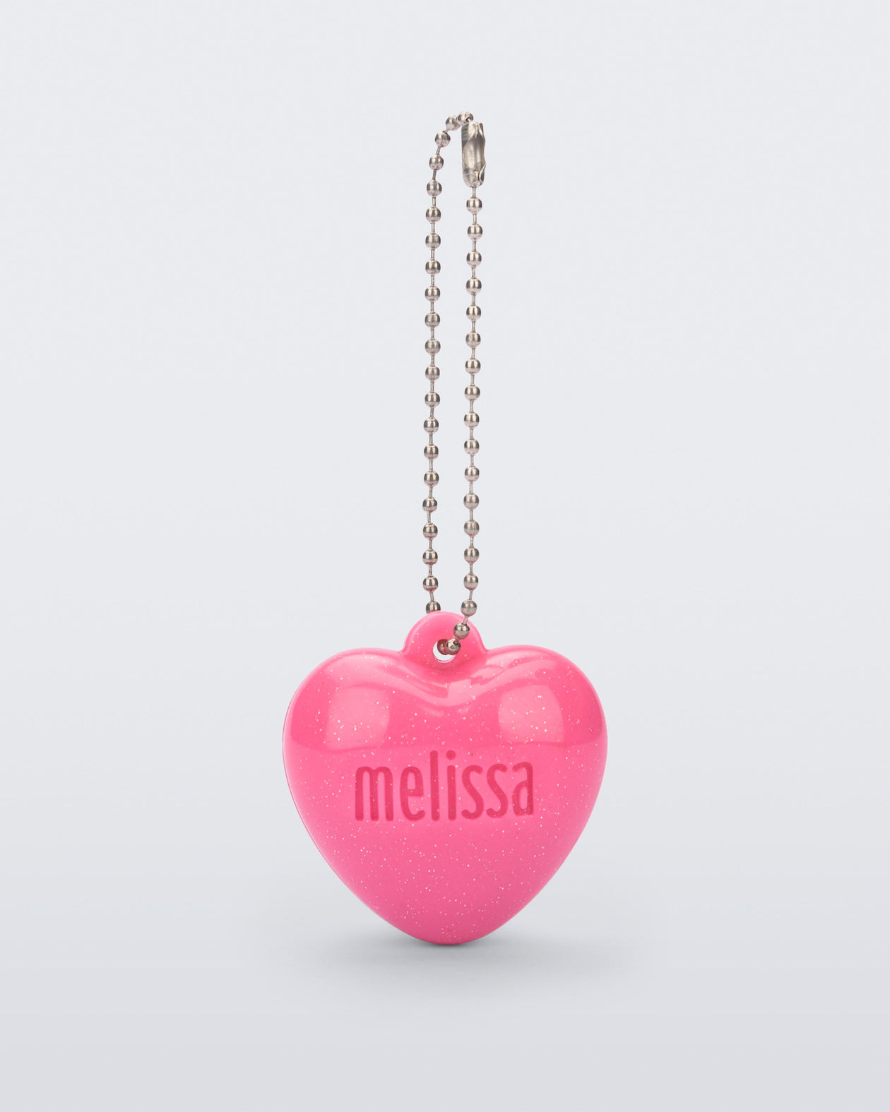 Front view of a pink Heart Charm with the word Melissa engraved