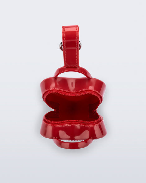 Top view of a red Heartbeat Pocket bag charm