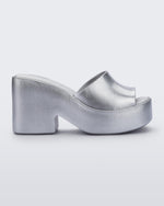 Side view of Melissa Posh platform slide in silver