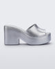 Side view of Melissa Posh platform slide in silver