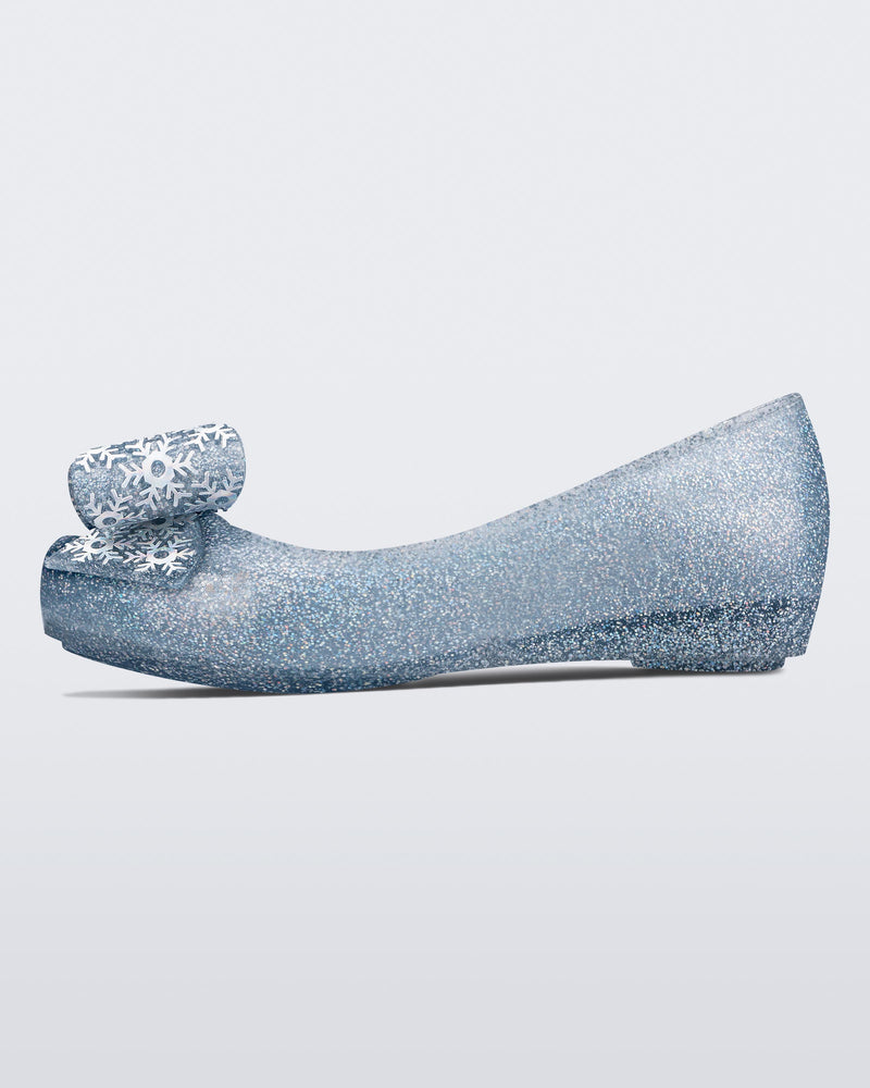Inner side view of a blue/glitter kids Ultragirl Frozen flat.