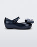 Side view of a Mini Melissa Ultragirl peeptoe ballet flat  for baby in blue with star printed butterfly bow applique. 