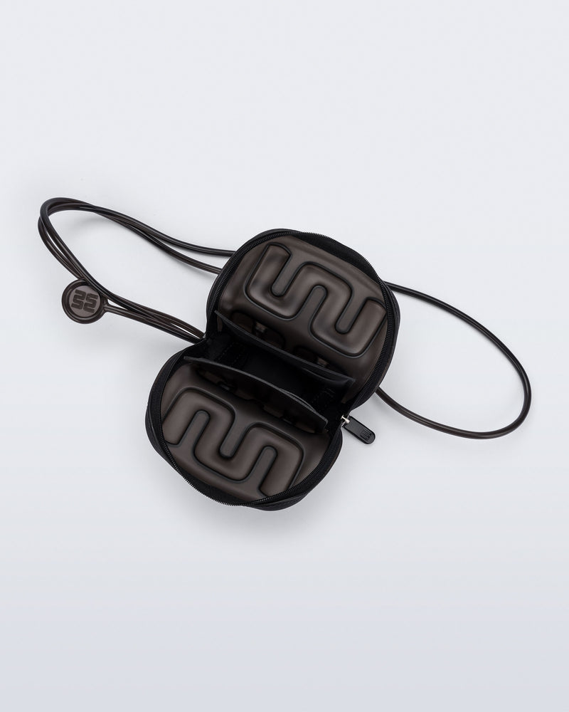 Top view of a black Jelly Wallet with inside pocket and zipper