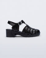Side view of a pearly black Possession Heel kids fisherman sandals