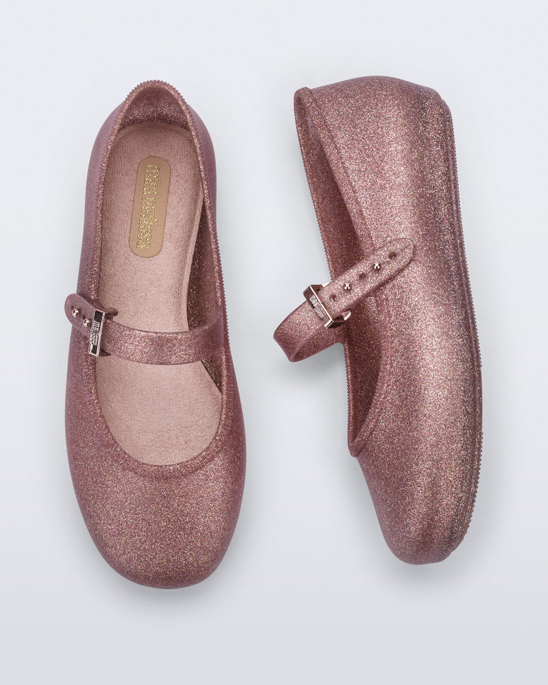 Top and side view of a pair of glitter pink Soft Ballerina kids flats