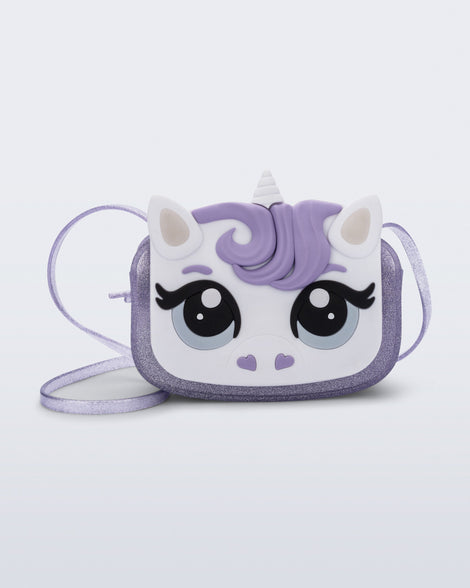 Front view of a lilac glitter Dreamy Unicorn kids bag with a unicorn face on front with lilac hair