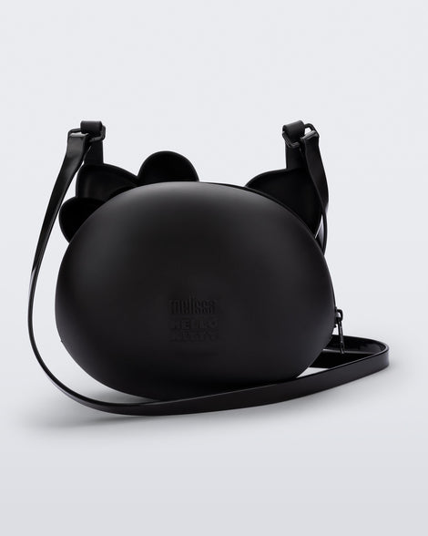 Top view of a black Hello Kitty + Friends Cute Bag with the face of Hello Kitty