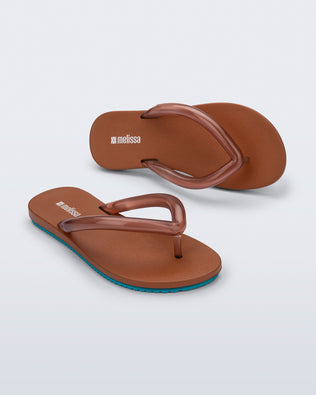 Product element, title Flip Flop Airflow in Brown/Blue
 price $49.00