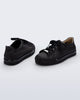 Back and angled view of a pair of black Wow Sneakers with black laces