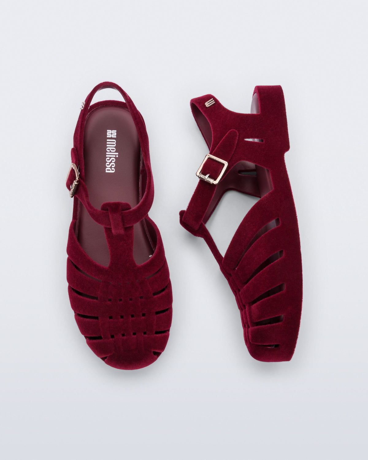 Side and top view of a pair of flocked red Possession Velvet fisherman sandals