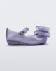 Side view of a glitter lilac Ultragirl Classic bow baby flat