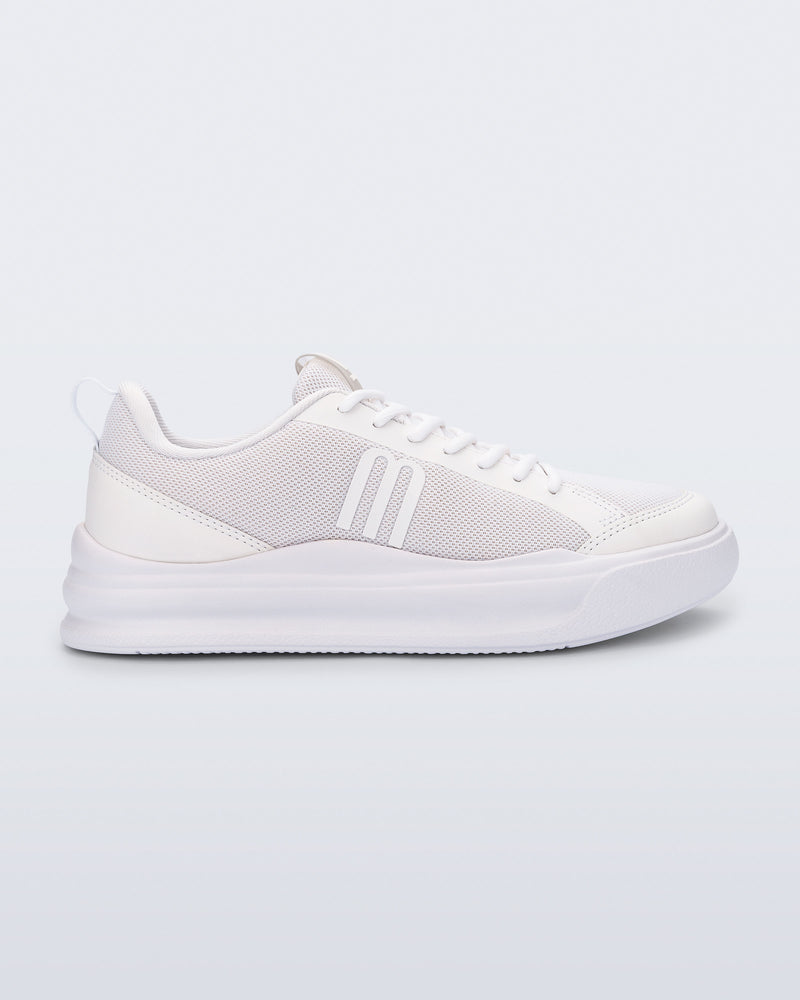 Side view of a white X Mood sneaker