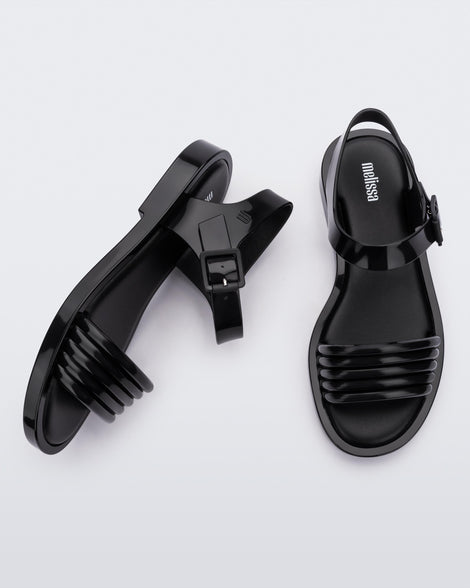 Side and top view of a pair of black Mar Wave women's sandals.
